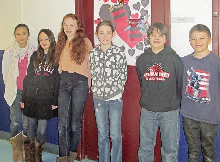 Sixth-grade students at Newmarket Junior/Senior High School are helping to run a food drive through Friday. From left, Morgan Buinicky, Alex Lulek, Kaylie Cullen, Nora Woody, Keenan Mills and Caden Foster