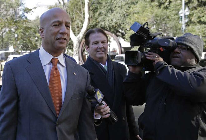 Former New Orleans Mayor Ray Nagin enters Federal Court in for jury selection and possible opening arguments for his corruption trial in New Orleans, Thursday, Jan. 30, 2014. Nagin is charged with accepting bribes, free trips and other gratuities from contractors in exchange for helping them secure millions of dollars in city work. The charges in his 21-count indictment, including bribery and wire fraud, are the product of a City Hall investigation that already has resulted in several convictions or guilty pleas by former Nagin associates. (AP Photo/Gerald Herbert)