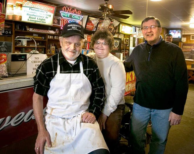 From left, Charlie Porubsky, Cecelia Pierson and Bill Pierson keep Porubsky's Deli and Tavern running. The business has been around since 1947.