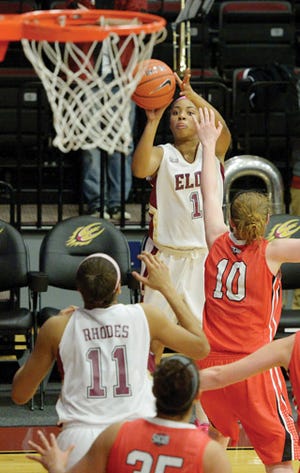 Elon's Zora Stephenson shoots a 3-pointer over Davidson's Hannah Early during Monday night's Southern Conference game.