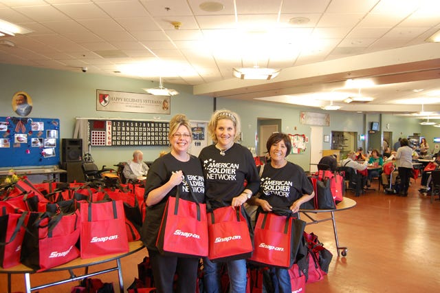 American Solider Network founder Annie Nelson (center) and a team of volunteers from ASN were on hand at the California Veterans Home - Barstow on Monday. ASN visited the home for the program's annual Hearts for Heroes Valentine's Day Outreach.