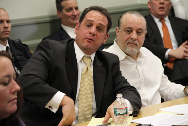 Attorney Peter Petrarca, left, with Gianfranco Marrocco, both co-owners of Club Karma, at a Providence Board of Licenses hearing in January. Petrarca, the club's lawyer, said Thursday that owners did everything they could to provide a safe environment for customers and staff.