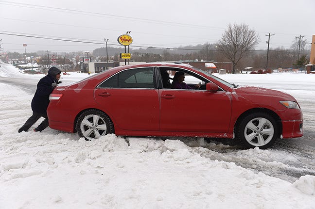 A lot of stranded motorists needed a push on Thursday morning.