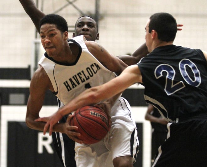 Havelock's Kyran Bowam is fouled as he drives to the basket on Thursday.