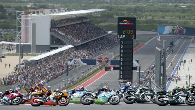 Riders navigate Turn 1 at the start of Austin’s MotoGP race at Circuit of the Americas last year. About 70,000 people are expected to attend this year’s race, organizers said in an application for state funds.