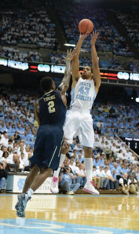 North Carolina Tar Heels forward James Michael McAdoo (43) shoots over Pittsburgh Panthers forward Michael Young (2) in the first half Saturday, February 15,2014 at the Dean E. Smith, Chapel HIll, NC. PJ Ward-Brown/The Courier-Tribune