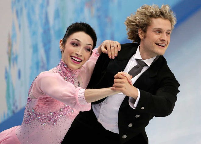 Meryl Davis and Charlie White, of the United States, marked 78.89 in the short dance Sunday to take the lead entering today's free dance.