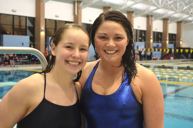 Hope's Sarah Sheridan, left, and Erica Dunham went 1-2 in the MIAA in 1-meter diving. Dan D'Addona/Sentinel staff