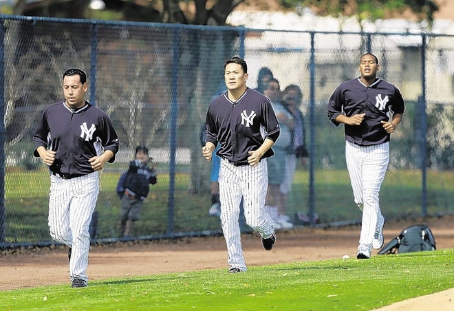 Yankees' Masahiro Tanaka, center