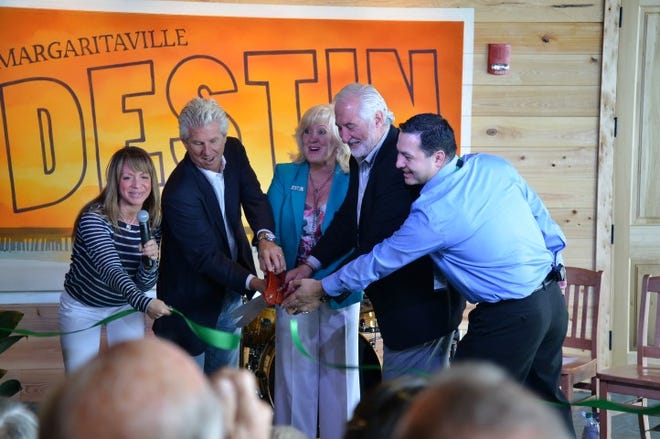 With a big "fins up" shout, Jimmy Buffett's Margaritaville in Destin is officially open for business.