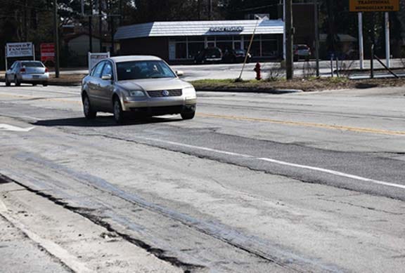New Bern motorists are anxious to see Neuse Boulevard repaved.