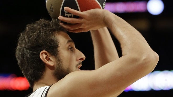 Marco Belinelli, who won the NBA’s 3-point shooting competition during All-Star game weekend, has improved the Spurs’ outside shooting and bench. CREDIT: Gerald Herbert/AP