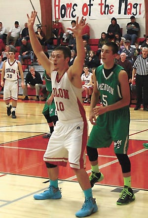 Cousins Bradley Brittingham and Zach Darmofal battle inside Tuesday night between Colon and Mendon.