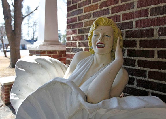A popular Marilyn Monroe statue recently was found lying in the front lawn of the Ziegler Suites Hotel. The figure, a local landmark, likely was brought down by the recent snow and ice.