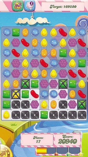 This undated file screenshot provided by Candy Crush shows "Candy Crush Saga," the maddeningly addictive mobile game that involves matching bright-hued virtual candies in a row to have them disappear, only to be replaced by more. King Digital Entertainment PLC, maker of the popular "Candy Crush Saga" mobile game, is planning to raise up to $500 million from an initial public offering of its common stock.