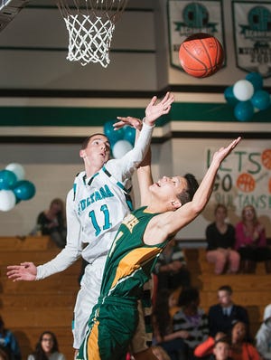 Sultana's L.J. Harrie, left, and Brea Olinda's Sam Choi battle for a rebound during the second half of Wednesday night's playoff game in Hesperia. Brea Olinda won the first-round game.