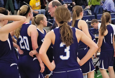 John Carden photo
York High School girls basketball coach Rick Clark (center) and team members react following Wednesday’s 58-42 loss to Lake Region in the Western Maine Class B quarterfinals at the Portland Expo.