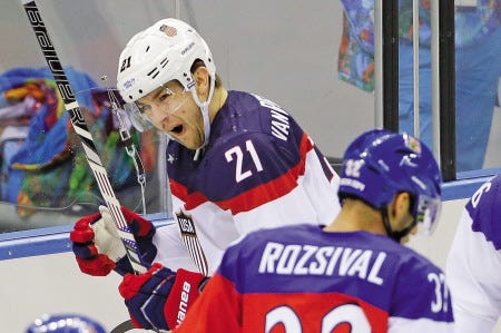 Former University of New Hampshire hockey standout James van Riemsdyk (21) celebrates after scoring a goal during Team USA’s 5-2 win over the Czech Republic in Wednesday’s Olympic quarterfinals in Sochi, Russia. The U.S. will play defending Olympic champion Canada in the semifinals on Friday.