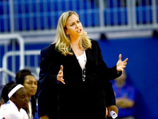 Florida coach Amanda Butler talks to a player from the sidelines during the Gators' 82-72 win over Mississippi State on Jan. 2 at the O'Connell Center.