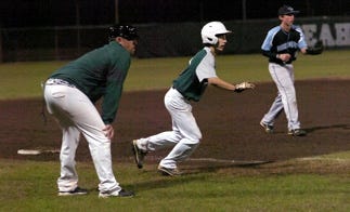 South Walton Tyler Slotter gets a lead off third base in the first inning against North Bay Haven. Slotter connected for two hits and two RBIs in the 5-2 win.