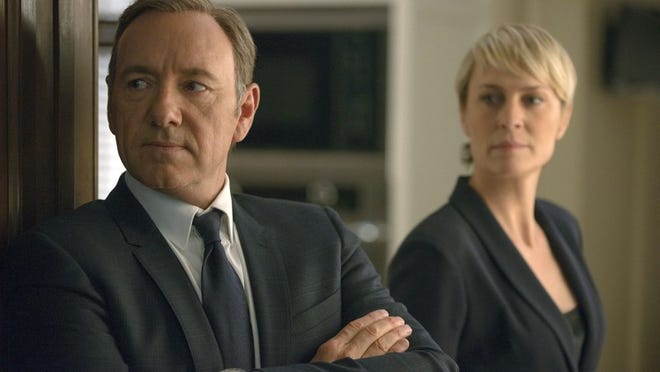 Kevin Spacey, left, stars as Francis Underwood, and Robin Wright plays Claire Underwood in a scene from “House of Cards.” The second season of the popular original series premiered Feb. 14 on Netflix.