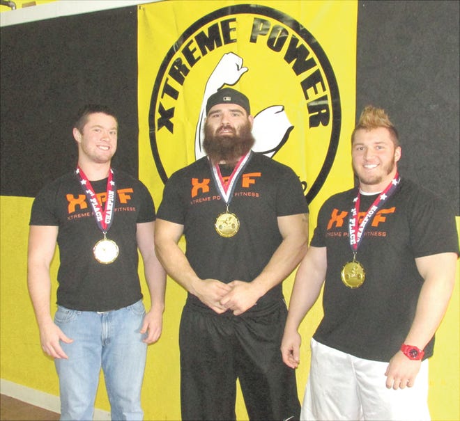 Three members of Xtreme Power and Fitness in Kewanee — from left, Ryleigh Clark, Daniel Bell and Shayne Neubert — won medals at the United Powerlifting Association nationals in Dubuque, Iowa.