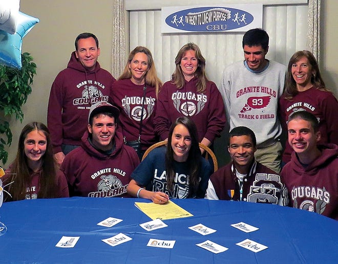 Granite Hills cross country runner Katie Deimling signs a letter of intent to attend California Baptist University. Also pictured are, in the front row from left to right, Larissa Morse, Nick Deimling, Zack Maroste and Ethan Lish, and in the back row from left to right, Pete Morse, Karen Morse, Kim Deimling, Andrew Rivera and Susan Bennis.