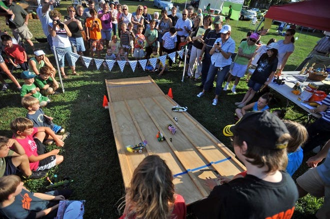 FILE PHOTO The Lower Makefield Farmers Market hosts special events like its annual zucchini races at Veterans Square Park. Volunteers are being recruited to help run the weekly market that runs from late May or early June through the end of October.