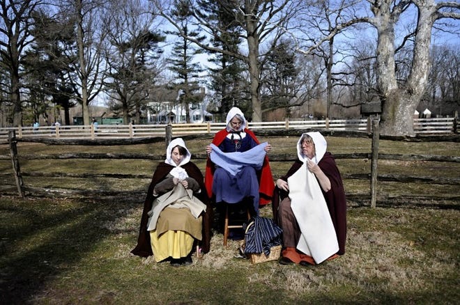 FILE PHOTO Three re-enactors demonstrate how to sew 17th century clothing during a Charter Day event at Pennsbury Manor in Falls, Sunday, March 10, 2013.