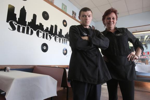 Jason Sanders and Lo Enste are the new co-owners of Sub City Grill in Uptown Shelby. (Ben Earp/The Star)