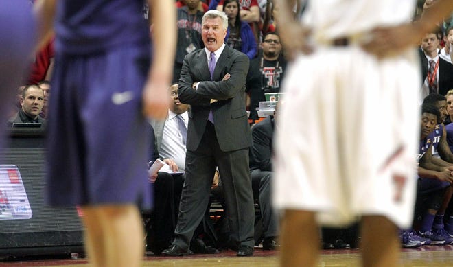 Kansas State's coach Bruce Weber yells towards the court during their NCAA college basketball game against Texas Tech on Tuesday in Lubbock.