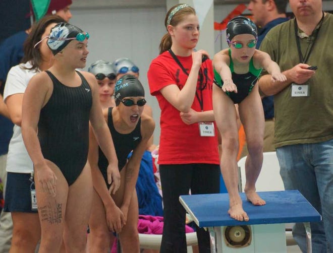 Courtesy of Mary Beth Lyons Katie Lyons gets set to jump in for her leg of the female 10 and under medley relay.