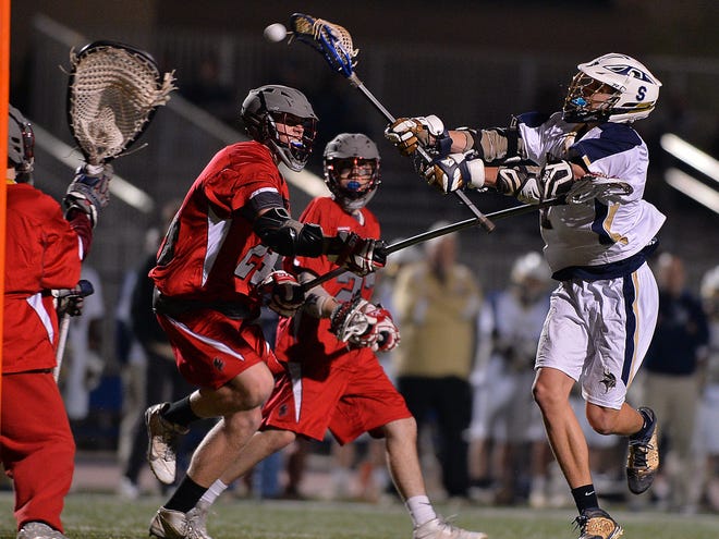 Spartanburg’s Mills Griffin (7) takes a shot during Tuesday night’s game against Nation Ford.