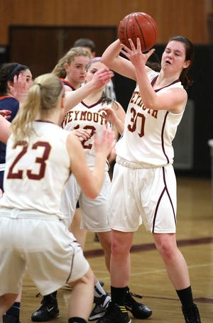 Braintree's Colleen O'Brien and Weymouth's Colleen Perry fight for the rebound.