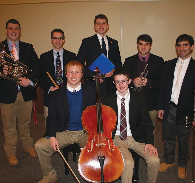 Musicians honored from St. John’s include: seated: Cellists Brett Cotter (Sterling) and Jacob Lachappelle (Whitinsville). Standing, left to right: Evan Frohock (Grafton), Sam Palermo (Shrewsbury), Luke Dombroski (Lancaster), Gianfranco Cesareo (Worcester), and Benjamin Sarkis (North Grafton.)