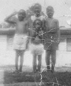 In this photo from 1957, from left, Alphonzo, Margaret, Roland, and at bottom, Barbara Scott are shown. They were among the first black children to attend Havelock Elementary School.