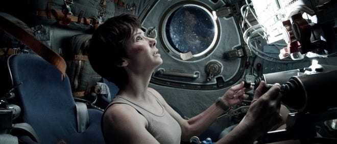 Sandra Bullock plays one of a pair of astronauts struggling to survive a catastrophic mishap in orbit in “Gravity.”