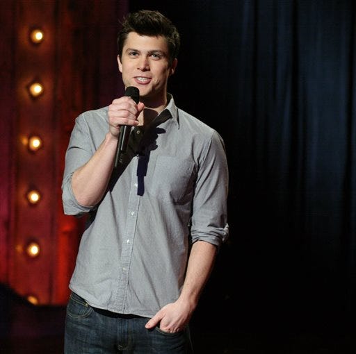 File-This Jan. 14, 2014 photo released by NBC shows writer-comedian Colin Jost performing on "Late Night with Jimmy Fallon," in New York. Jost, the NBC comedy show's head writer, made his first appearance on the spoof newscast, seated alongside co-anchor Cecily Strong. The baby-faced, anchor-handsome Jost began by voicing gratitude for his new on-air role. He called it "a dream come true." Among his news items was the 50th anniversary of Pop-Tarts, which he described as "the official breakfast of kids whose parents are in way over their heads." (AP Photo/NBC, Lloyd Bishop,File)