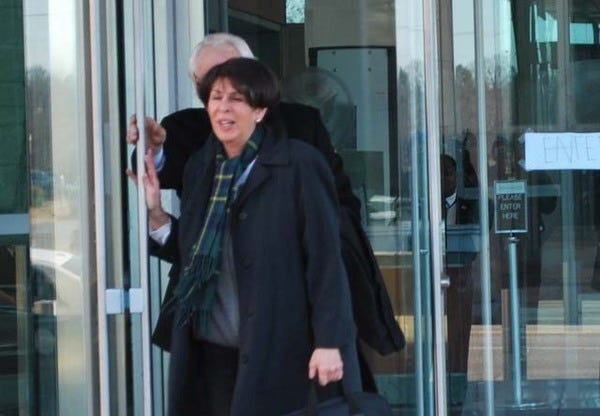ARKANSAS NEWS BUREAU / Former state treasurer Martha Shoffner leaves federal court in February after pleading not guilty to 10 counts of mail fraud. Her trial on federal bribery and extortion charges was postponed Monday because of wintry weather