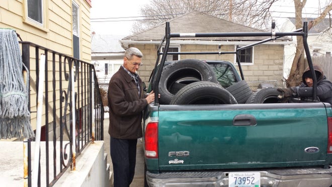 David Almeida, 57, at his home at Pomona Avenue. Police say he was was responsible for the illegal dumping of hundreds of tires in Providence.