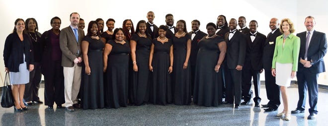 Members of the Bethune-Cookman University Chamber Choir stand with MOAS/Guild officials.