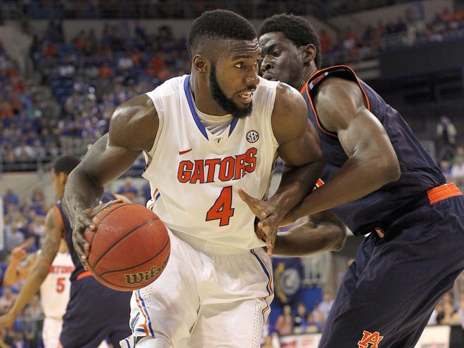 Florida center Patric Young (4) cited an improved attitude for the on-court success he's found as a senior. Young is averaging 10.7 points per game and has a team-high 27 blocked shots this season.
