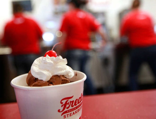 Employees work the custard counter at the recently opened Freddy's Frozen Custard and Steakburgers Monday. (Stephen Spillman / AJ Media)