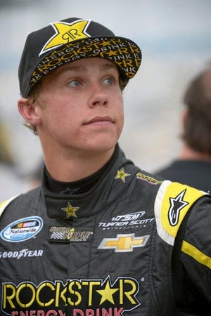 AP PHOTO
Dylan Kwasniewski looks up at the sky after qualifying for the NASCAR Nationwide Series auto race at Daytona International Speedway in Daytona Beach, Fla., on Feb. 21.