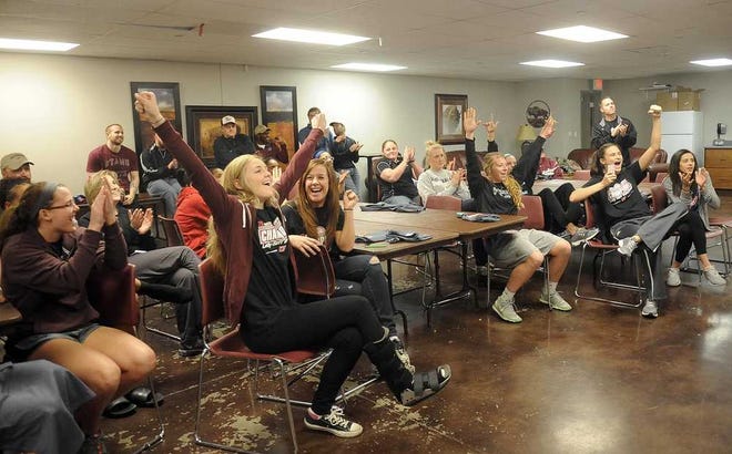 Members of the West Texas A&M Lady Buffs basketball team and supporters react as the team learned it would host the South Central Region Tournament at First United Bank Center. The Lady Buffs will host St. Edward's at 5 p.m. Friday.