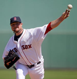 Red Sox pitcher Jon Lester threw three scoreless innnings Monday in Boston's 6-2 win over the Rays.