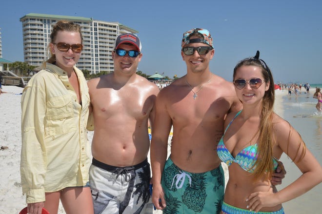 Ole Miss graduate students Ashley Mesecke and Trent Cox posed with San Jacinto students, Ryan Sullivan and Jordan Peirsol. The four were vacationing together with their families from Houston, Texas.