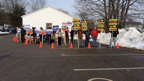 Lots of signs greeted voters in Hampton Falls on Tuesday.