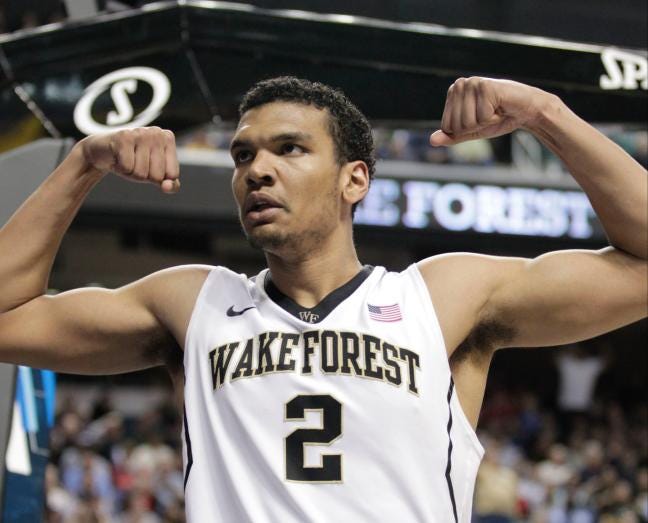 Wake Forest's Devin Thomas flexes his muscles after making a basket against Notre Dame during the second half of a first round NCAA college basketball game at the Atlantic Coast Conference tournament in Greensboro, N.C., Wednesday, March 12, 2014. Wake Forest won 81-69.