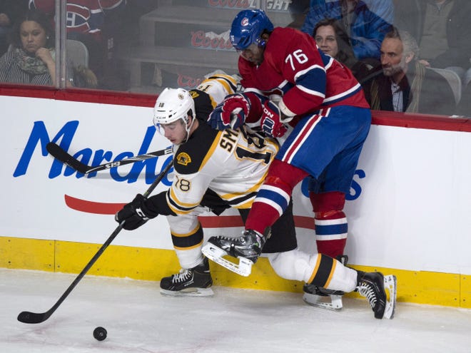 Montreal's P.K. Subban tries to stop Boston's Reilly Smith during first-period action Wednesday night in Montreal.